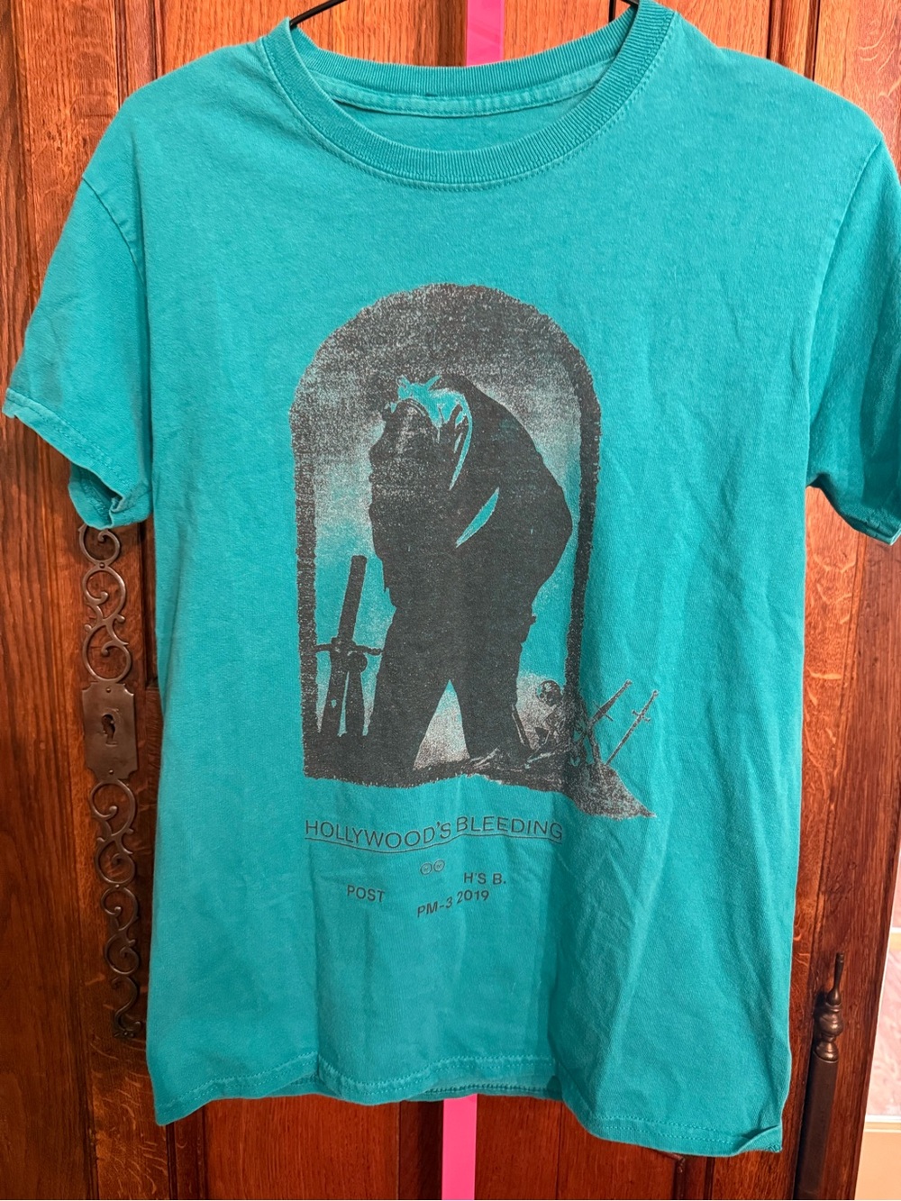 Vintage Graphic Teal T‑Shirt with Dark Print